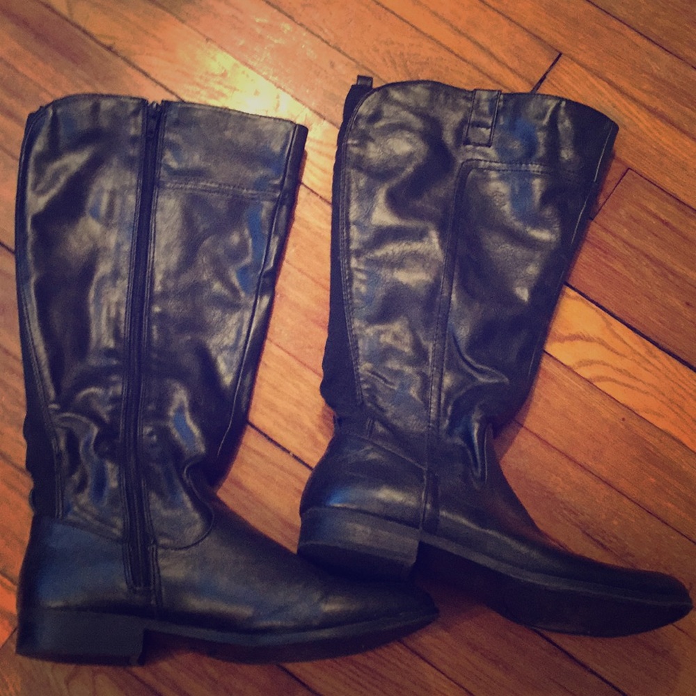 Tall black boots.